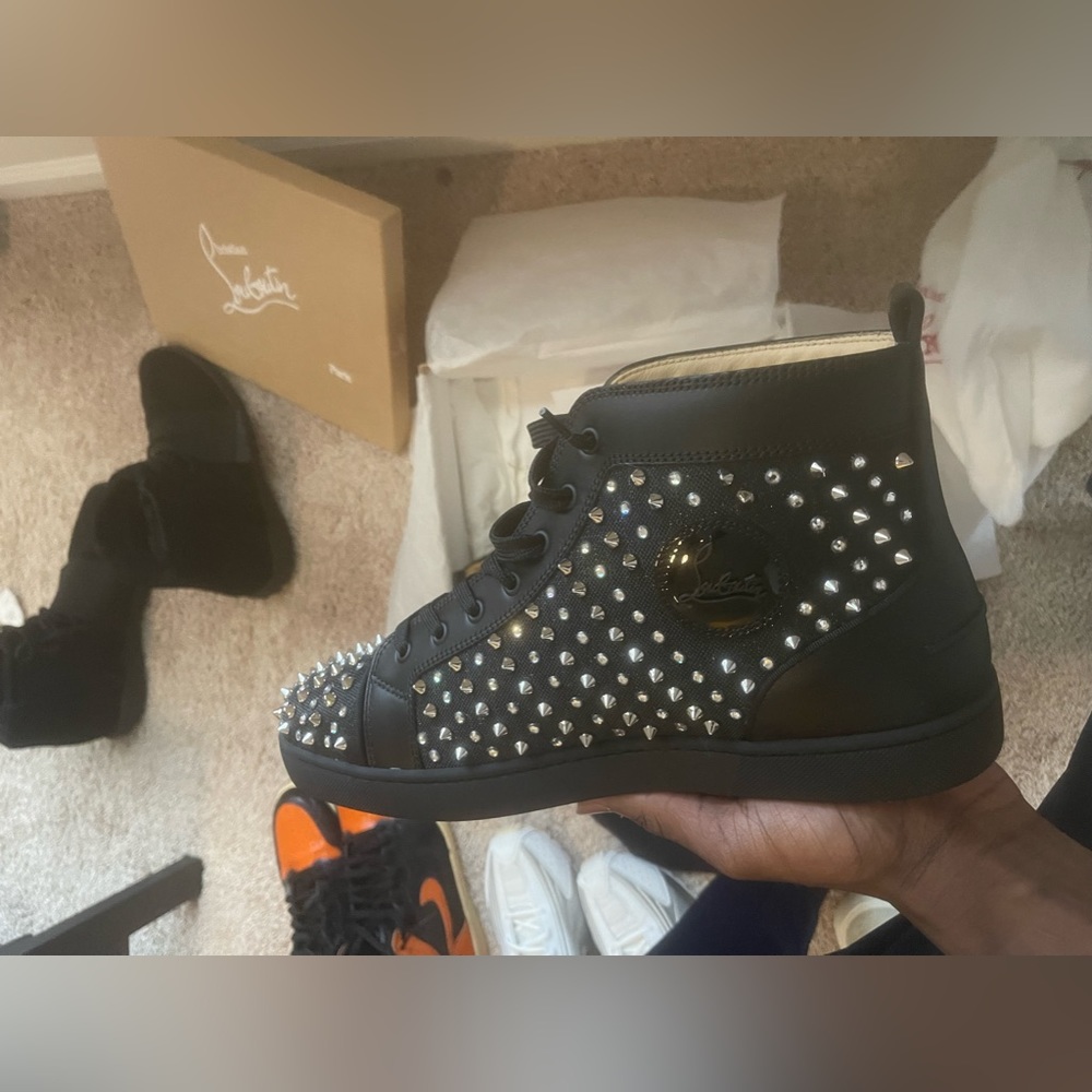 Brand new in box Christian Louboutin, with receipt